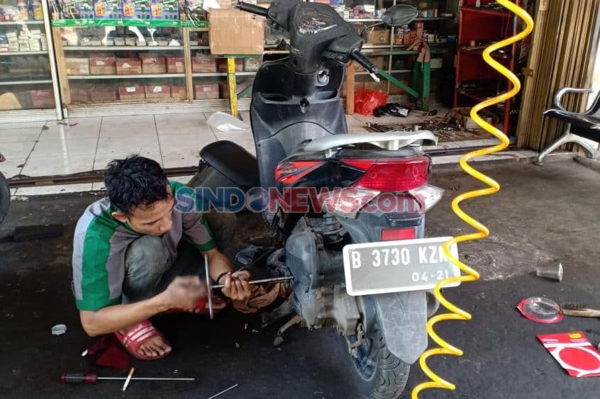 bengkel motor adiputra